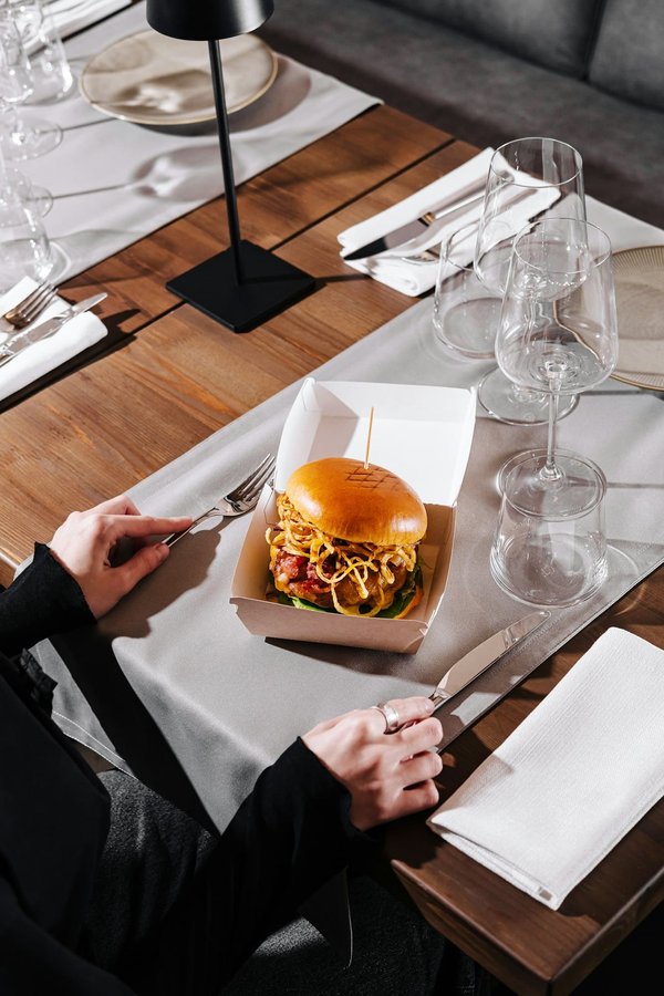 What's the Most Elegant Way to Style a Long Silk Scarf with a Corporate Suit?